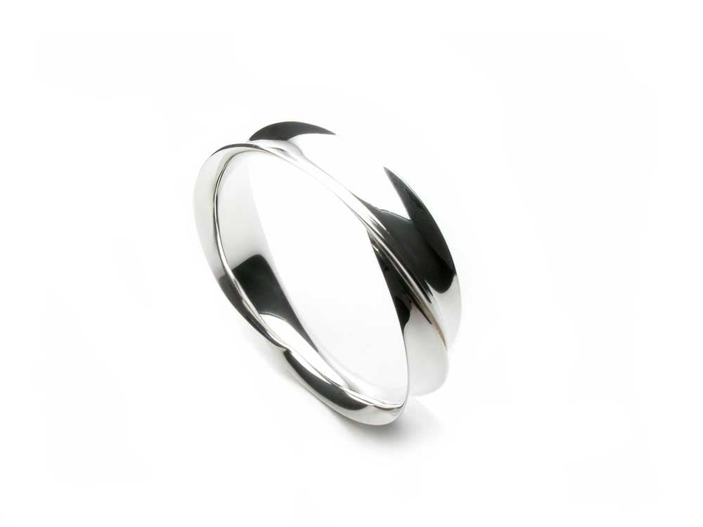 Sterling silver, concave overlapping design. $780.00