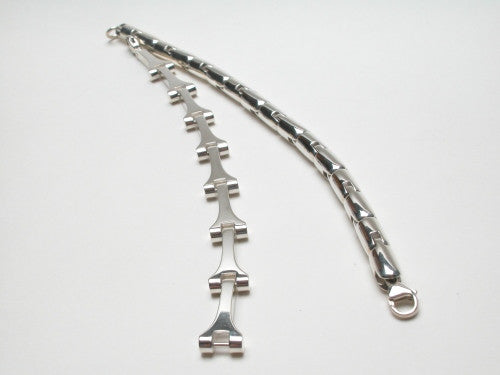 Sterling silver link bracelets. On the left Tour Eiffel Elements B120, on the right Rock'n'Roll BN042. $775.00