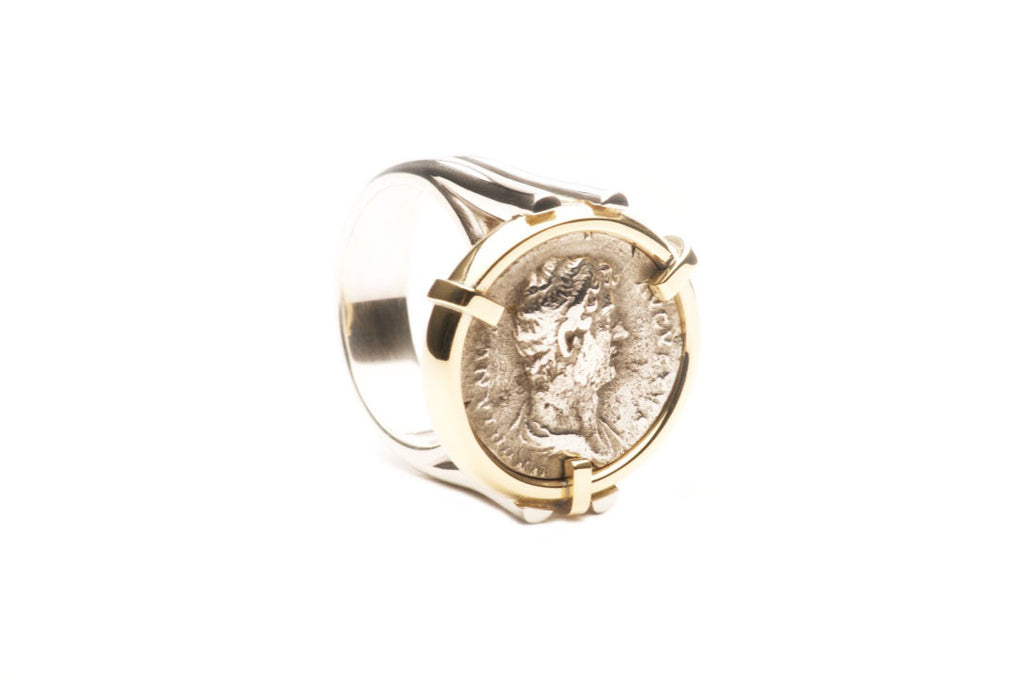 Custom made ring with a genuine silver Hadrian Roman Coin set in eighteen karat gold, ring shank sterling silver. $0.00