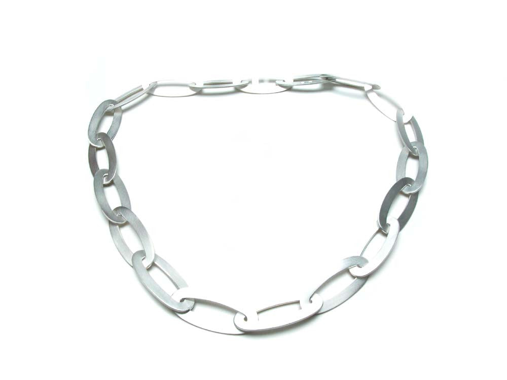  Sterling silver flat, oval links with integrated clasp. $980.00