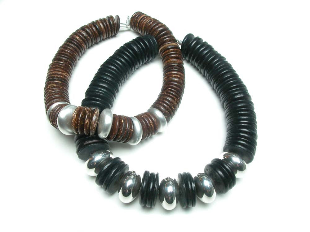 Sterling silver large hand made beads and natural wood discs. $1,650.00