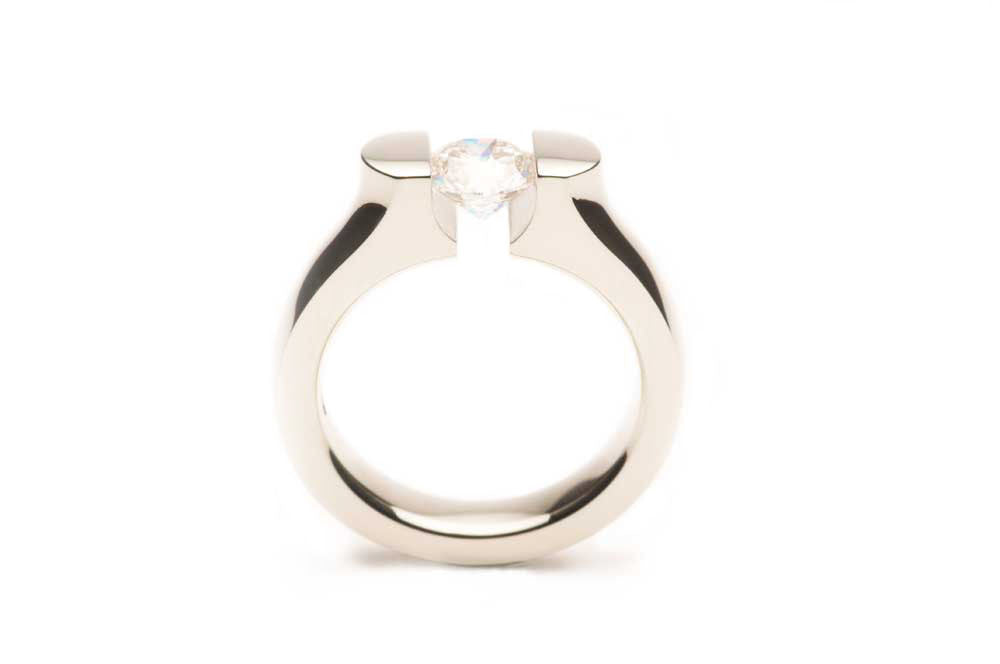Eighteen karat White Gold ring with a pressure-set Diamond, made to order. $0.00