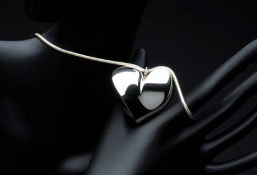 Sterling silver heart pendant. Sterling silver chain $ 100 to $140. $1,450.00
